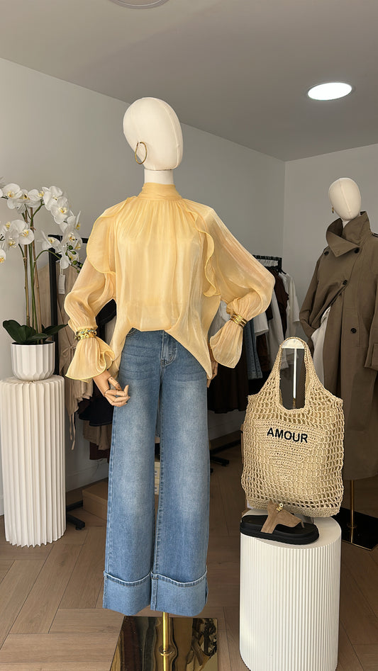 Blouse satinée effet lumière dorée ✨